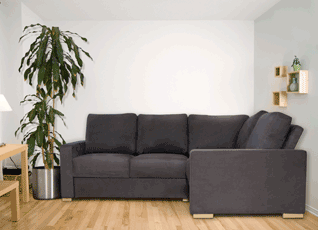 A corner sofa in the corner of a room