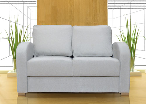A small sofa with narrow arms